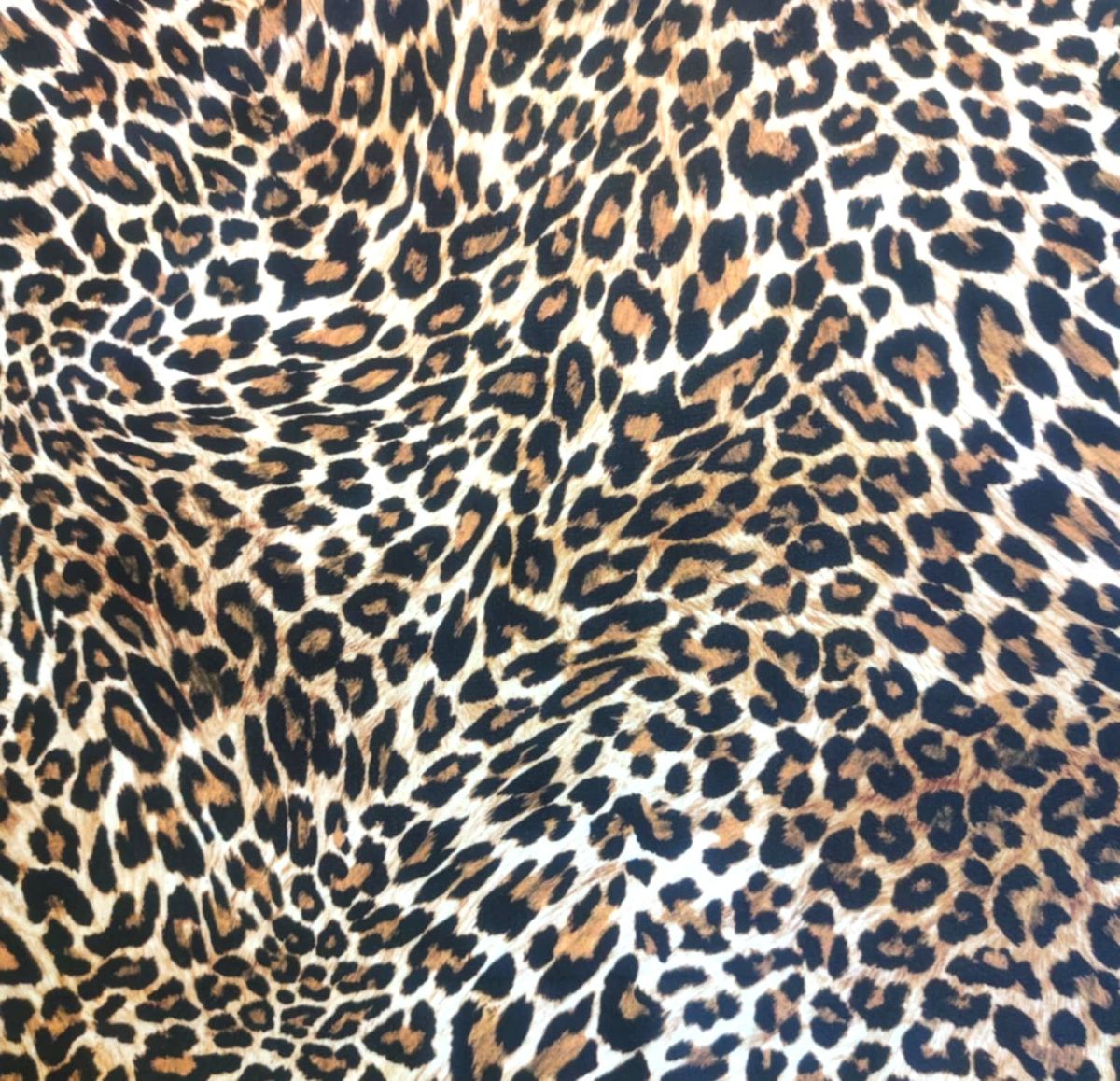 Leopard print swimwear fabric used in Nora Chantre swimwear collection.