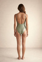 Back view of the Elara crocodile texture swimsuit by Nora Chantre.