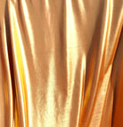 Metallic copper swimwear fabric from the Lumière Collection by Nora Chantre.