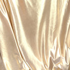 Metallic light gold swimwear fabric from the Lumière Collection by Nora Chantre.