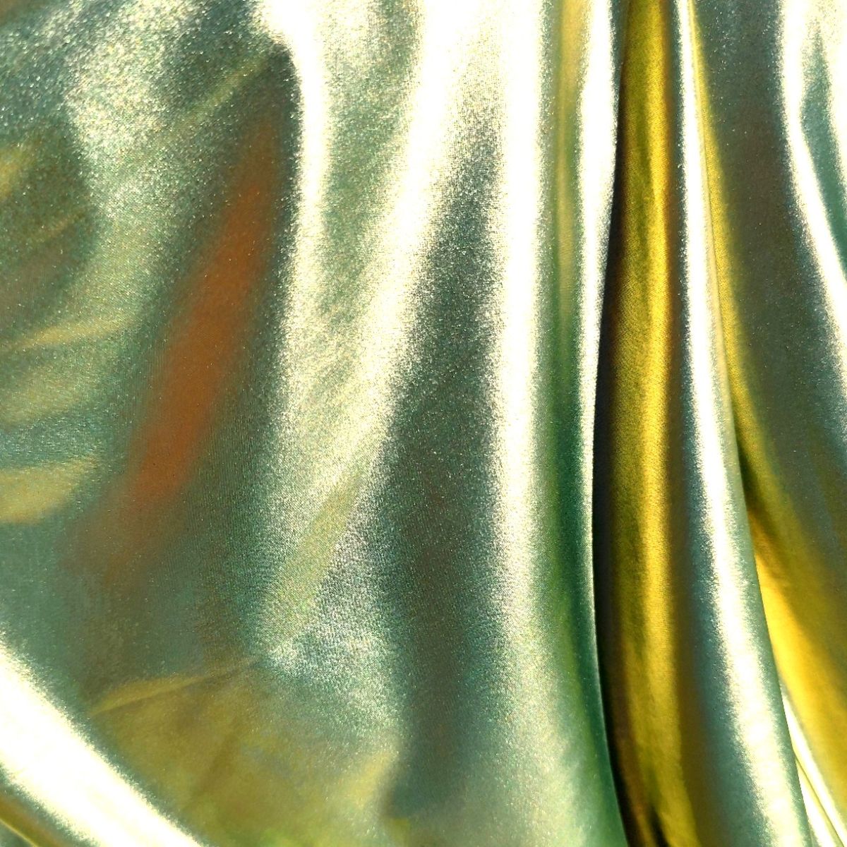 Metallic light green swimwear fabric from the Lumière Collection by Nora Chantre.