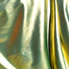 Metallic light green swimwear fabric from the Lumière Collection by Nora Chantre.