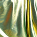 Metallic light green swimwear fabric from the Lumière Collection by Nora Chantre.
