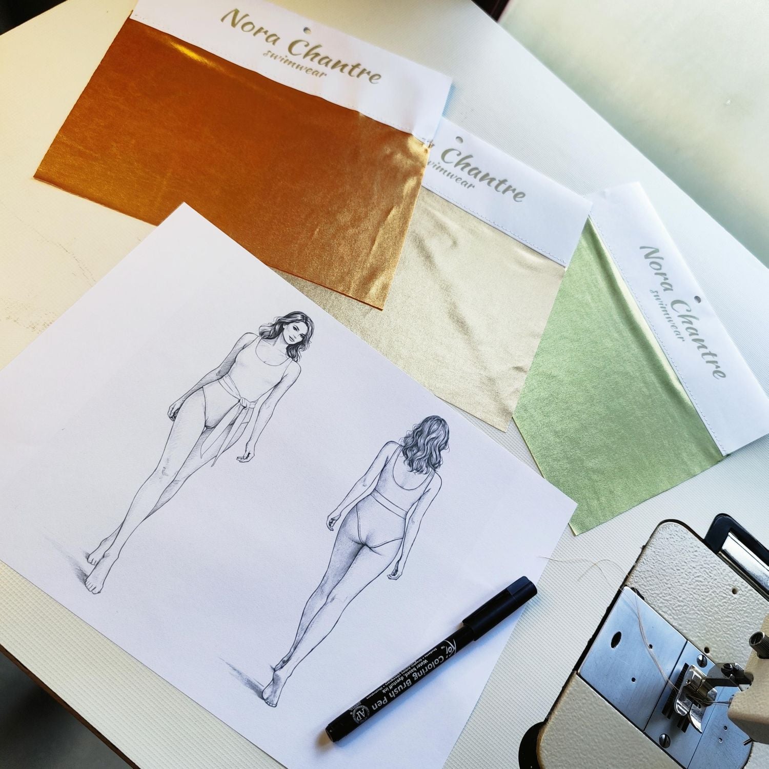 Swimwear design sketch and fabric samples from Nora Chantre swimwear collection.