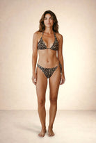 Seraya leopard asymmetric bikini by Nora Chantre front view with triangle top and gold chain detail